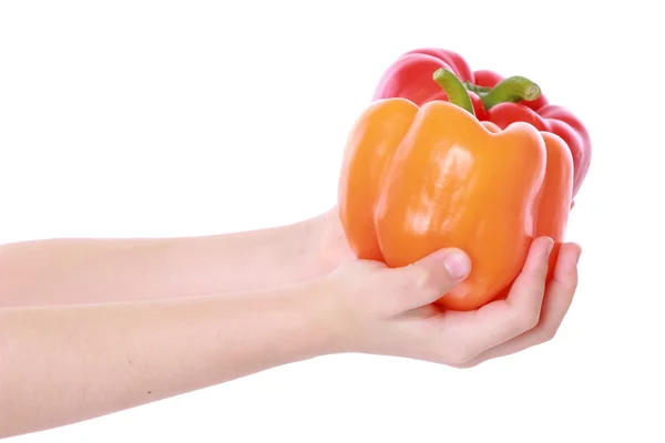 Segurando laranja e pimenta doce vermelha — Fotografia de Stock