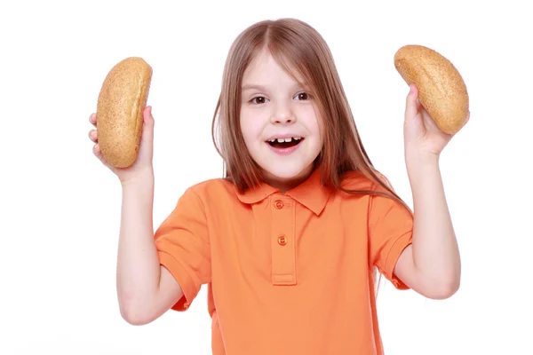 Menina com pães — Fotografia de Stock