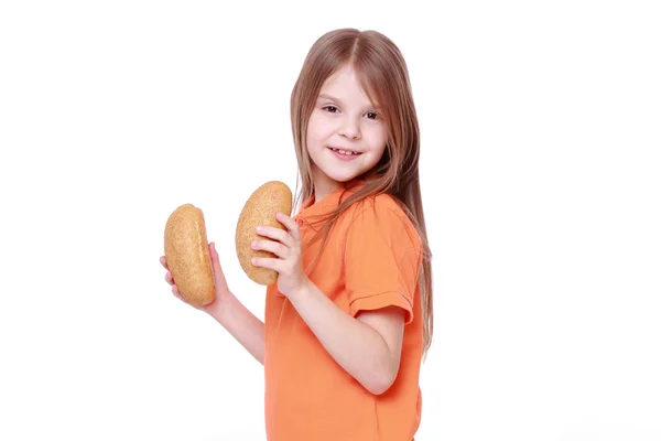 Menina com pães — Fotografia de Stock