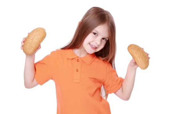 Menina com pães — Fotografia de Stock