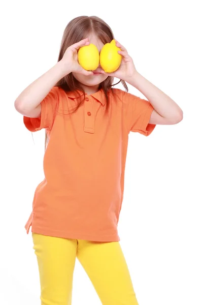 Girl with lemons — Stock Photo, Image