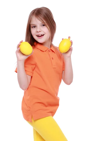 Girl with lemons — Stock Photo, Image