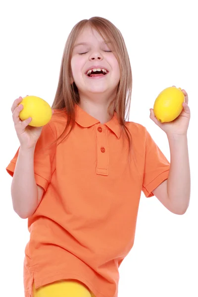 Ragazza con limoni — Foto Stock