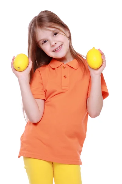 Girl with lemons — Stock Photo, Image