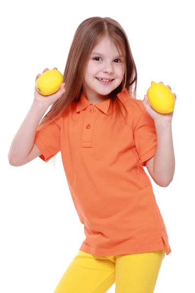 Ragazza con limoni — Foto Stock