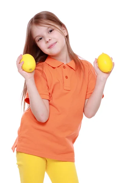Dívka s citrony — Stock fotografie