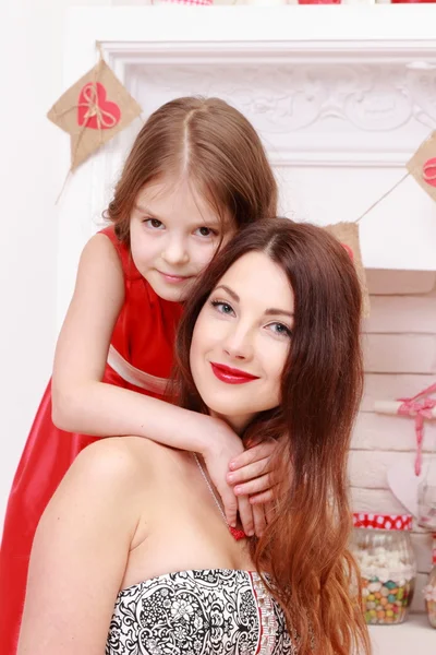 Mother and her daughter over Valentine's Day interior — Stock Photo, Image