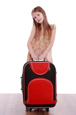 Bavullu küçük kız.