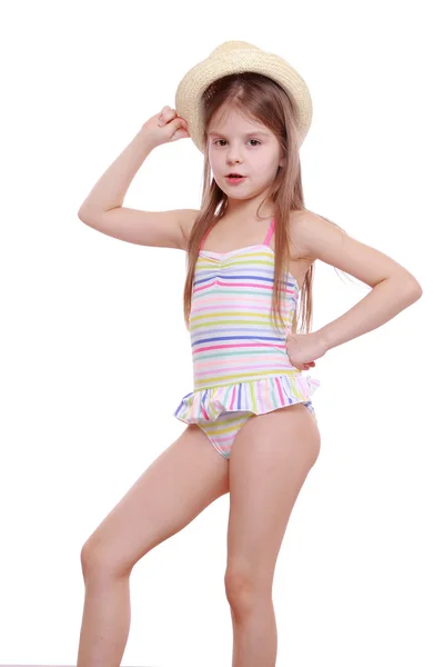 Girl in a swimsuit and a straw hat — Stock Photo, Image