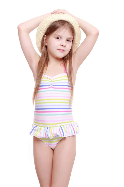 Girl in a swimsuit and a straw hat — Stock Photo, Image