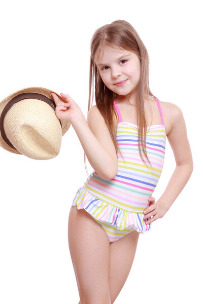 Girl in a swimsuit and a straw hat