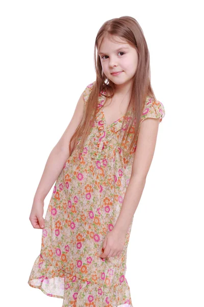 Girl in flowered dress — Stock Photo, Image