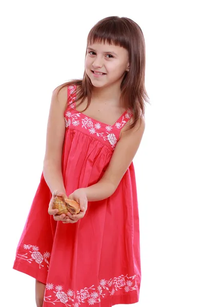 Girl holding sea shell — Stock Photo, Image