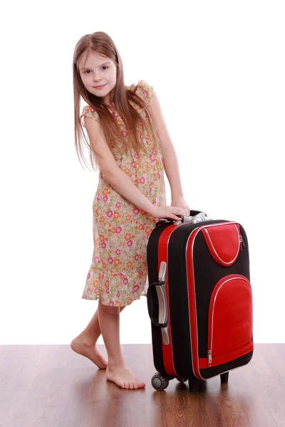 Little girl with suitcase Royalty Free Stock Images