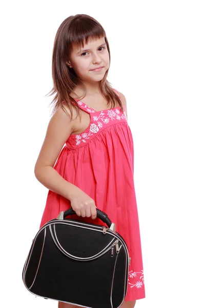 Model holding travel baggage — Stock Photo, Image