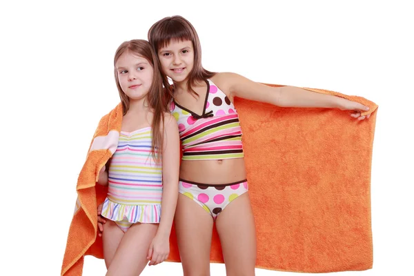 Girls holding towel — Stock Photo, Image