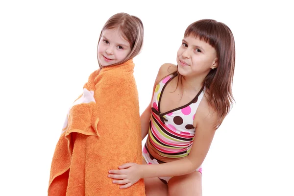 Girls holding towel — Stock Photo, Image