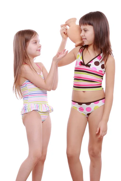 Girls with a clay jug — Stock Photo, Image