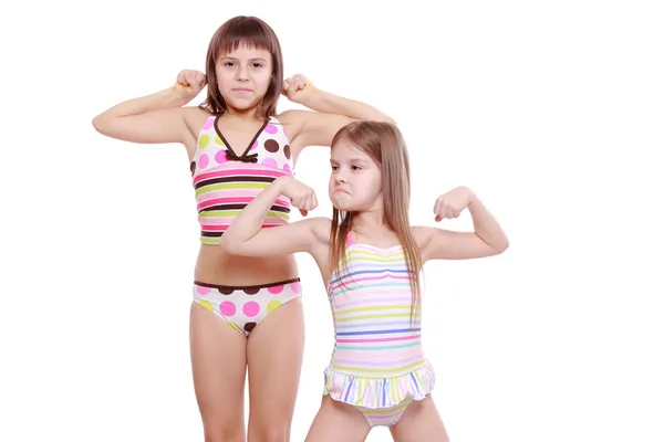 Little girls wearing summer swimsuits — Stock Photo, Image