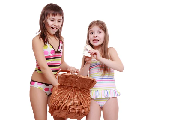 Girls with basket on white — Stock Photo, Image