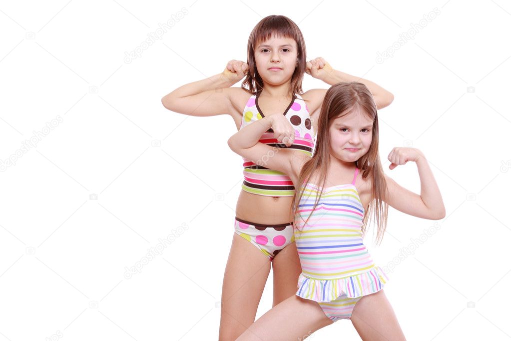 Little girls wearing summer swimsuits