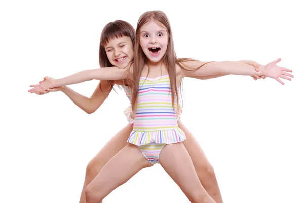 Kleine meisjes in een zwembroek — Stockfoto