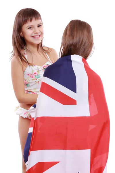 Chicas en traje de baño con bandera británica — Foto de Stock