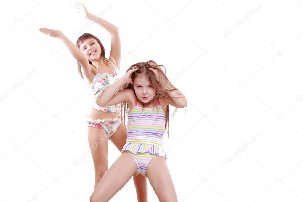 Little girls in a swimsuit