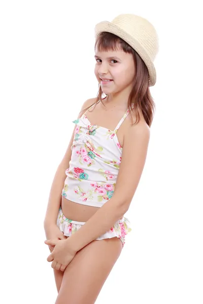 Girl in swimsuit and straw hat — Stock Photo, Image