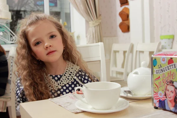 Girl at tea — Stock Photo, Image