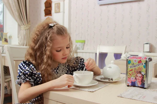 Girl at tea — Stock Photo, Image