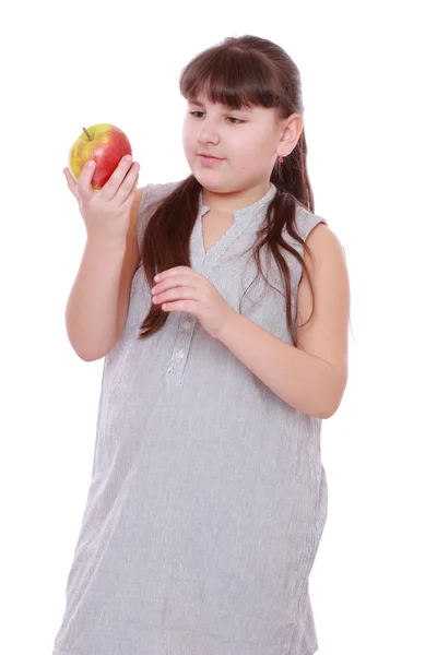 Chica con manzana —  Fotos de Stock