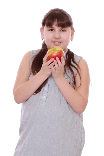 Flicka med äpple — Stockfoto