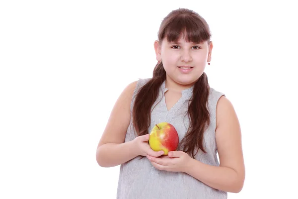 Mädchen mit Apfel — Stockfoto