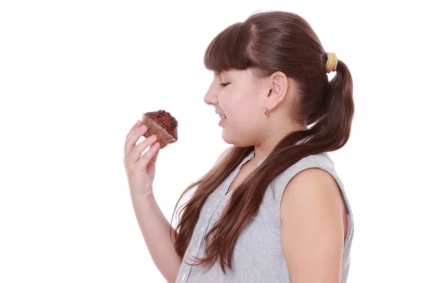 Menina segurando cupcake — Fotografia de Stock