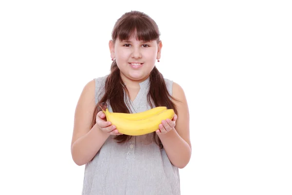Dívka Drží Žluté Banány Bílém Pozadí — Stock fotografie