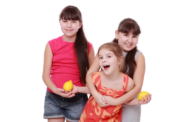 Girls with lemons — Stock Photo, Image