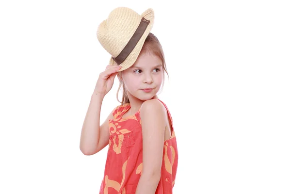 Girl in summer dress and straw hat — Stock Photo, Image