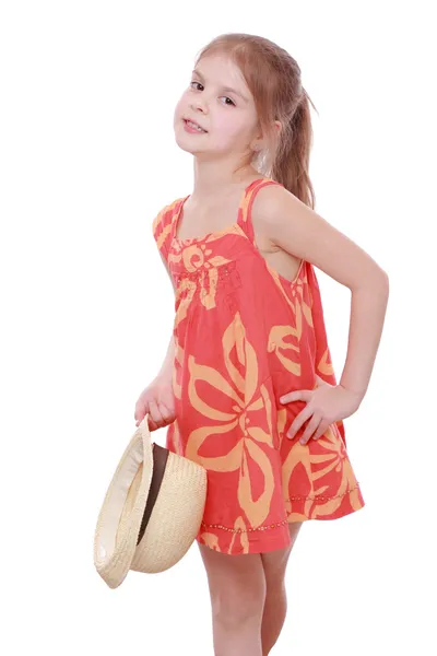 Girl in summer dress and straw hat — Stock Photo, Image