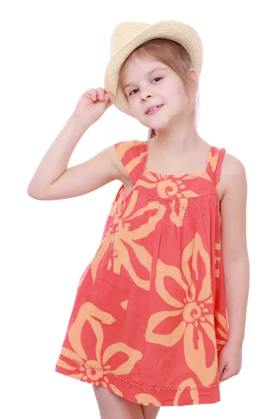 Girl in summer dress and straw hat — Stock Photo, Image