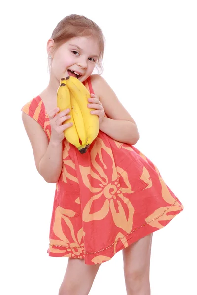 Fille exploitation bananes jaunes — Photo
