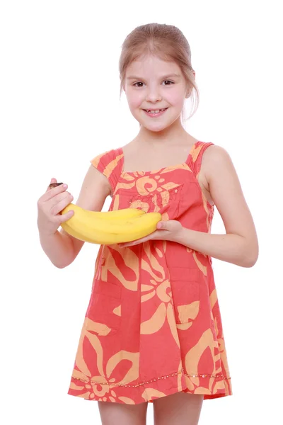 Kız holding sarı muz — Stok fotoğraf