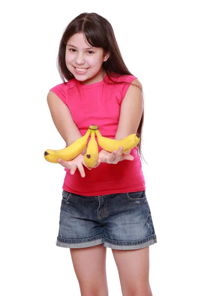 Mädchen mit gelben Bananen — Stockfoto