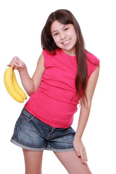 Menina segurando bananas amarelas — Fotografia de Stock