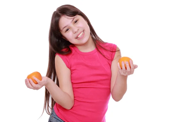 Kleines Mädchen Mit Mandarinen — Stockfoto