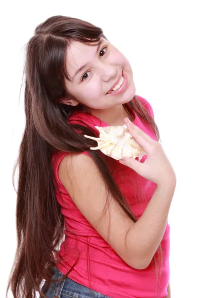 Girl holding seashell — Stock Photo, Image