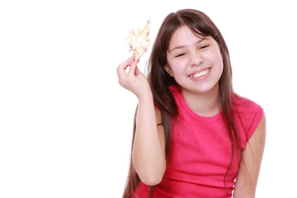 Girl holding seashell — Stock Photo, Image