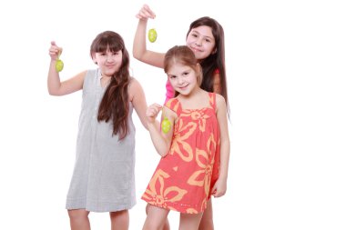 Girls holding eggs for Easter clipart
