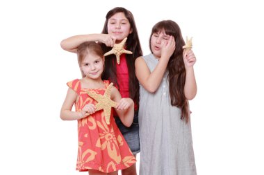 starfishes holding neşeli pozitif küçük kızlar