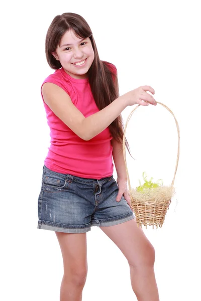 Girl holding basket with Easter eggs — Stock Photo, Image